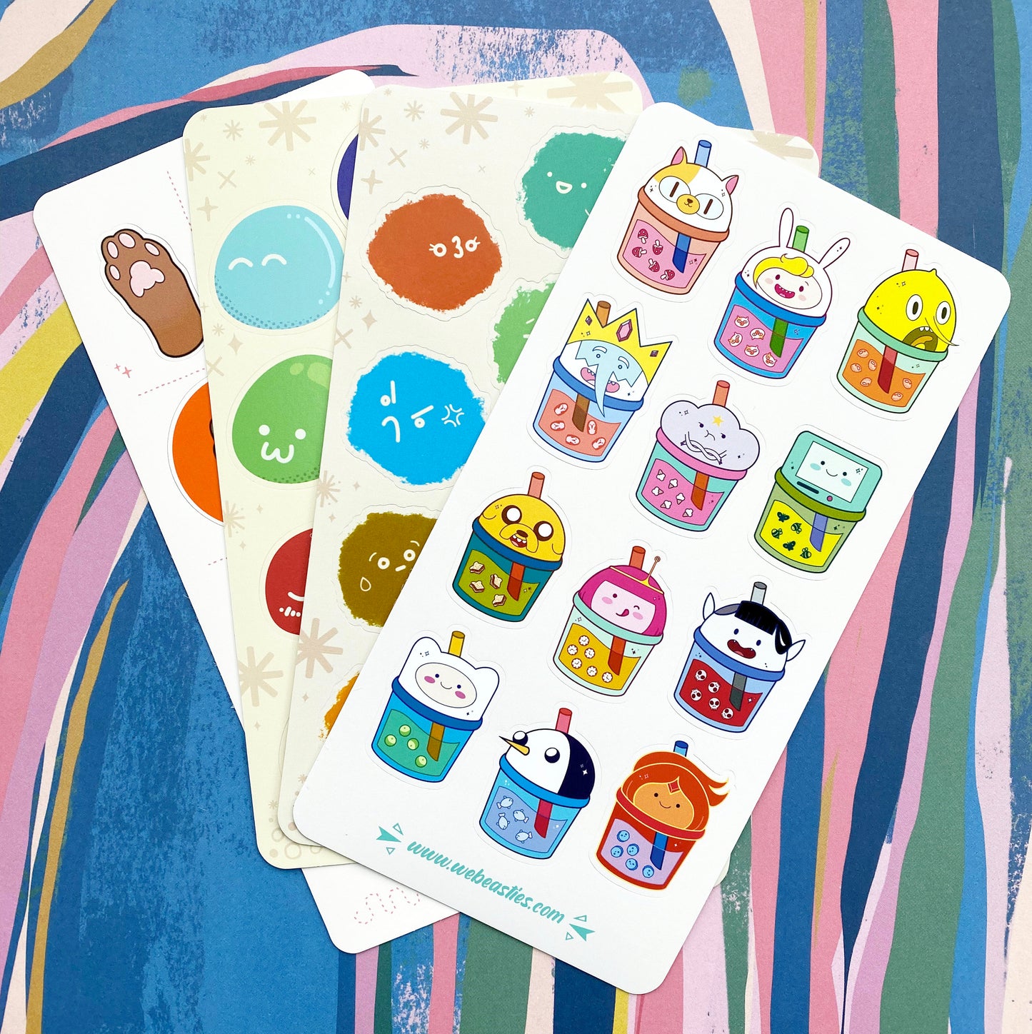 A photo of four sticker sheets sold by We Beasties.