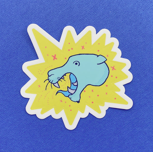 A child-like illustration of a blue cougar with sharp teeth. It's surrounded by pink stars and sits on a yellow star burst. The sticker is kiss cut.