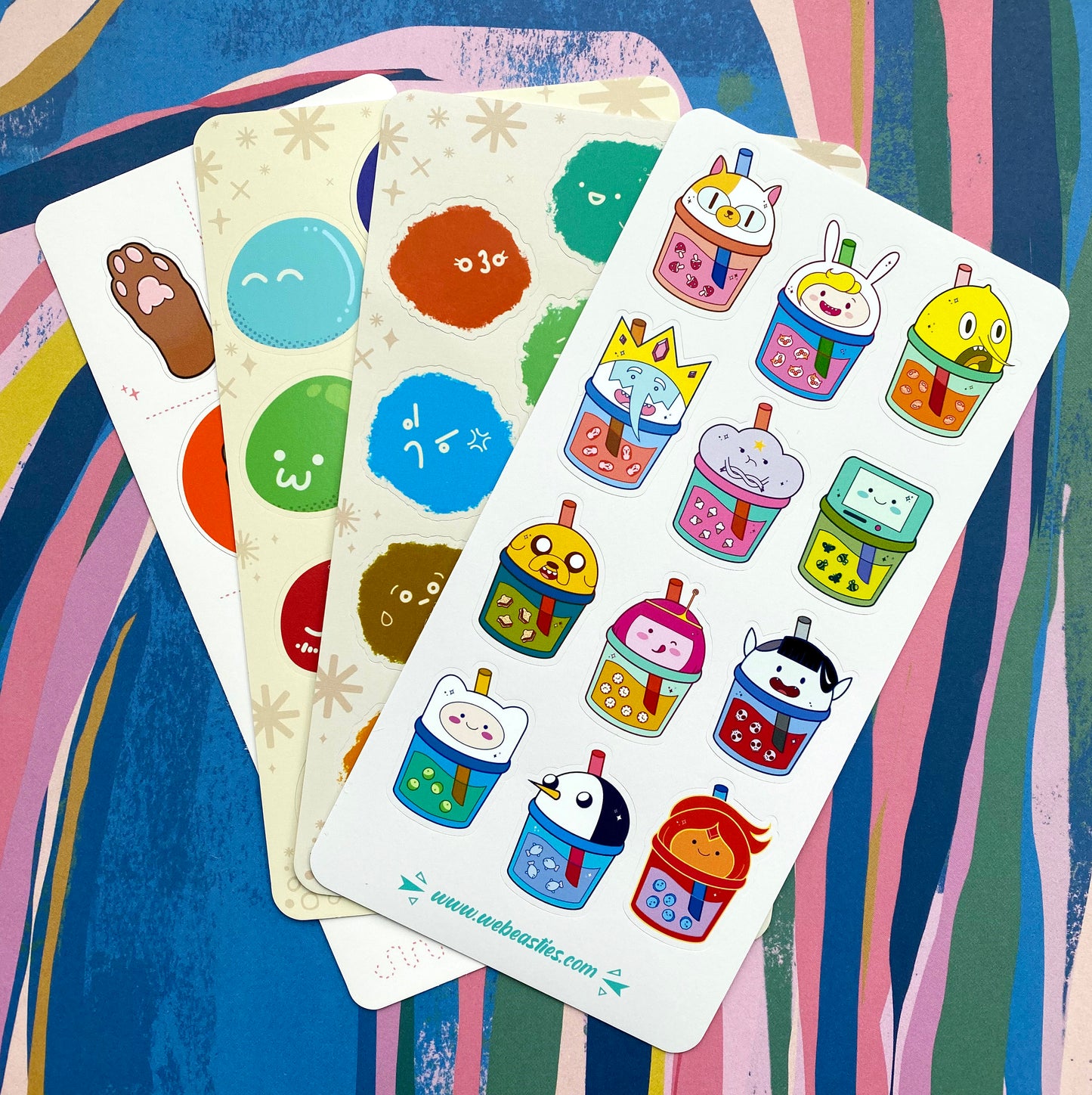 A photo of four sticker sheets sold by We Beasties.